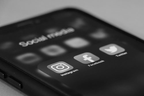 Social media display of app icons on mobile screen.